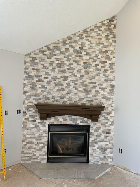 Fireplace in Yorktown, VA  Stack stone accent wall. tile hearth. solid hardwood mantle (1)