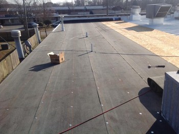 New roof at tidemill shopping center in Hampton va