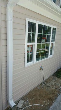 Completed Garage Conversion in Poquoson, VA.  This job included framing, plumbing, sheet rock installation and finishing, interior trim, doors, painting, ceramic tile flooring, electrical wiring and fixtures, new windows and vinyl siding.
